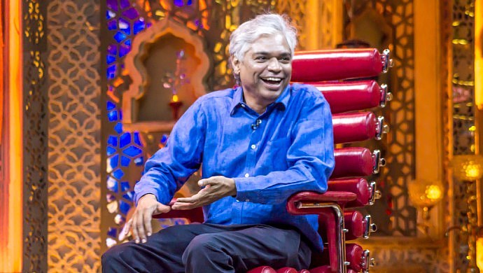 A Smiling Still Of The Fourth Guest On Weekend With Ramesh Season 4, Prakash Belawadi